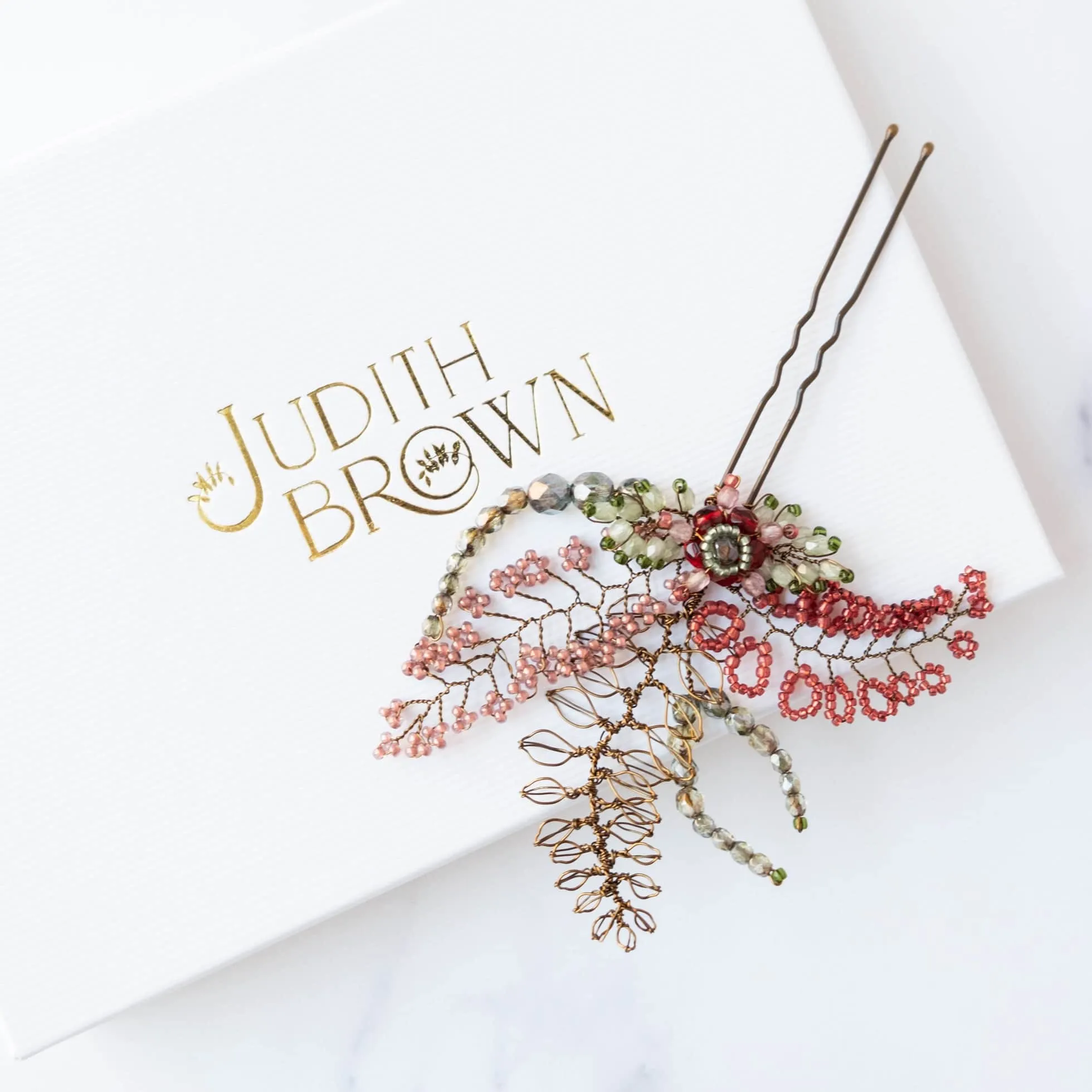 Fiorenza hair pin in reds and greens