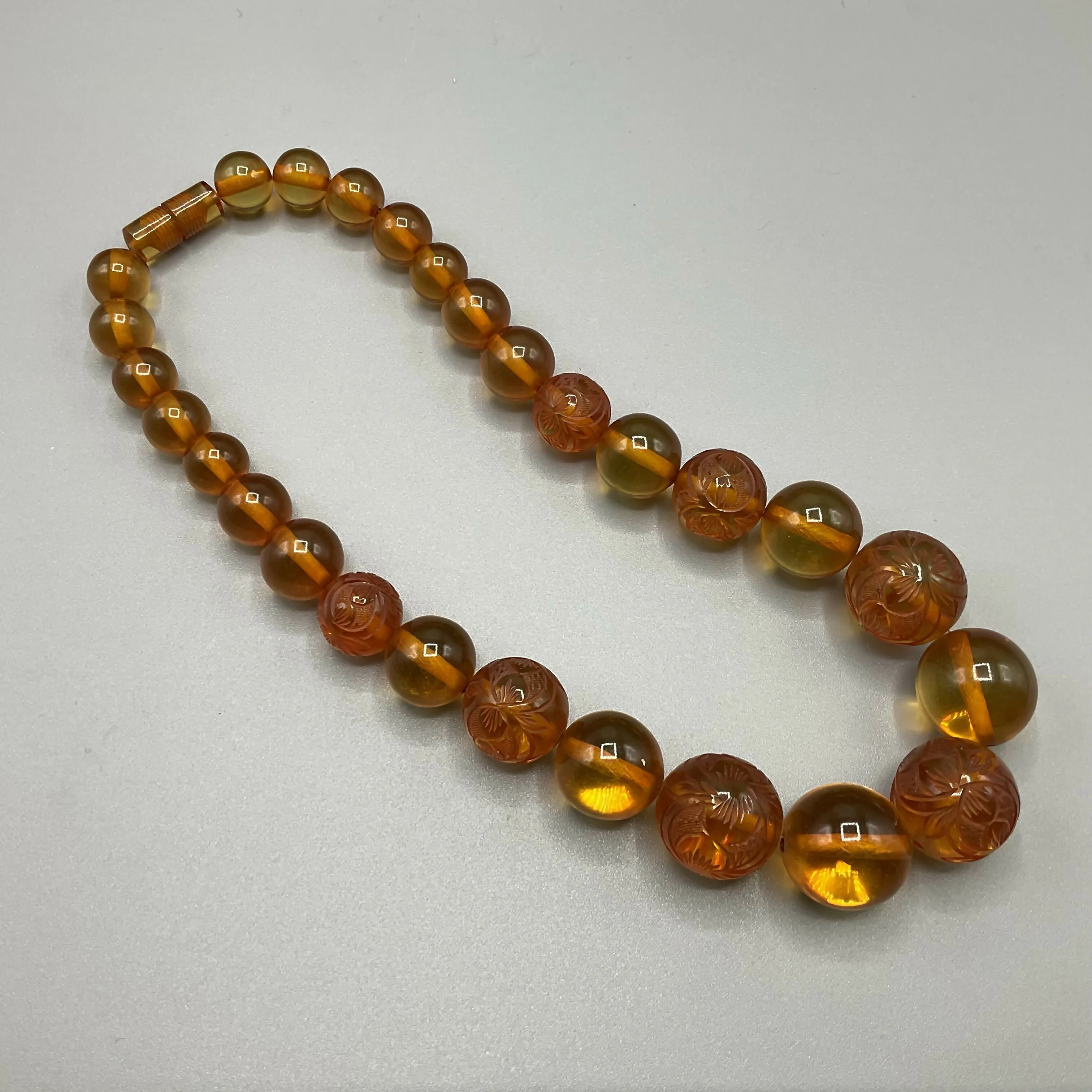 Vintage carved amber plastic necklace
